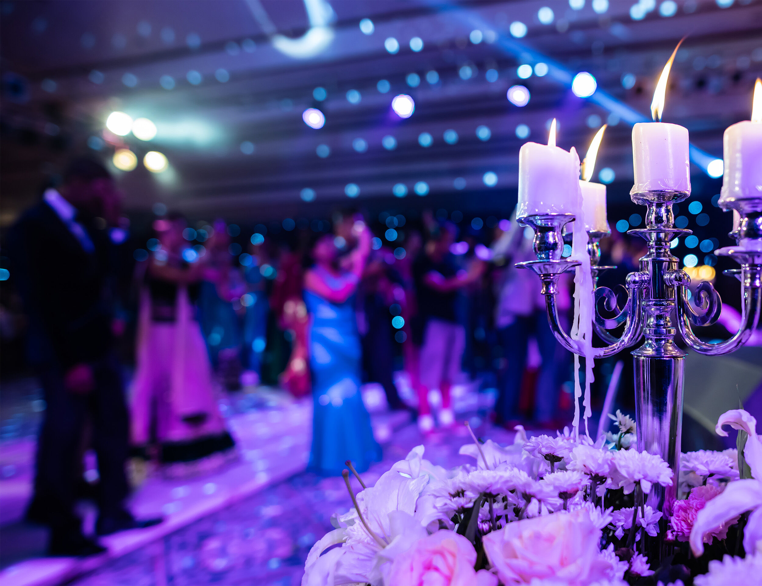 Elegant candle-lit décor creating a warm and magical ambiance at an Indian wedding celebration.